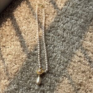 Elegant Pearl Necklace with Gold Accents